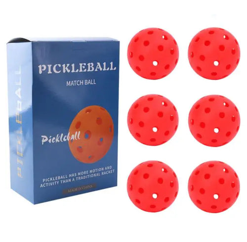 Pack de 6 balles de pickleball match 74 mm 40 trous, présentées en boîte cadeau.