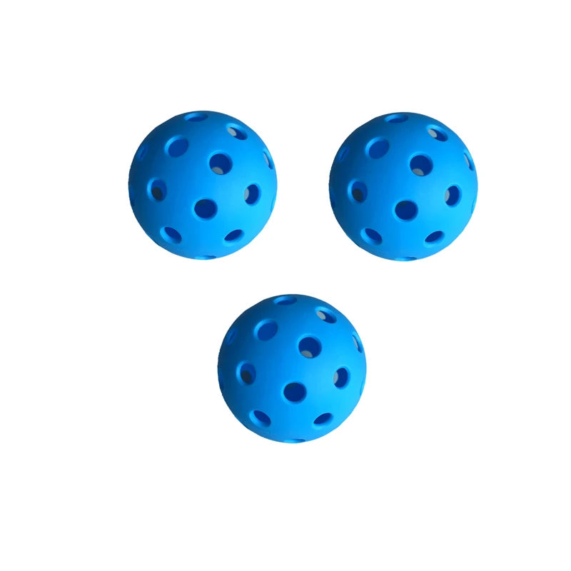 Lot de 3 balles de pickleball indoor bleu, avec structure à 26 trous pour un contrôle optimal et une visibilité parfaite sur les sols de gymnase.