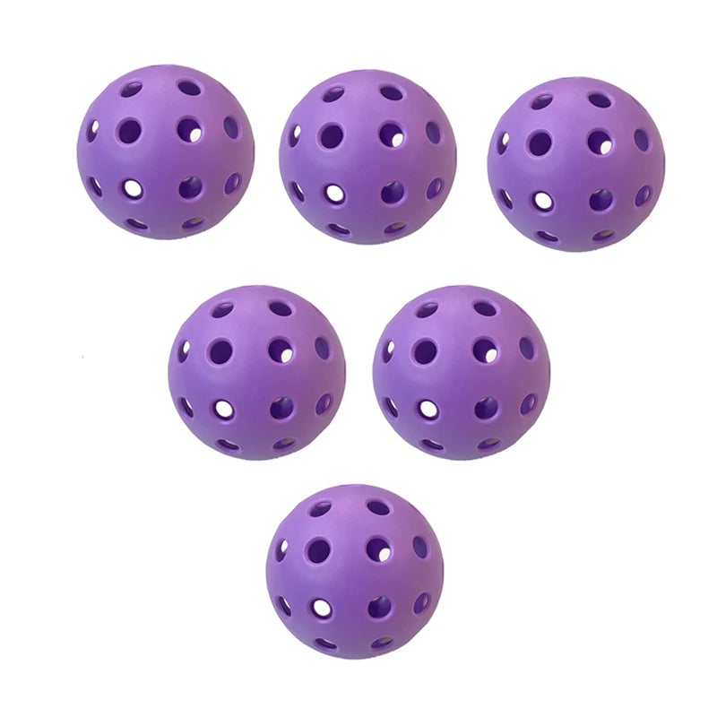 Lot de 6 balles de pickleball outdoor de couleur violette, diamètre 74 mm avec structure à 40 trous pour une stabilité de vol optimale en extérieur.