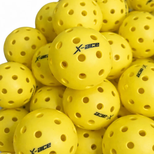 Lot de plusieurs balles de pickleball jaunes modèle X-ace avec 40 trous pour le jeu en extérieur.