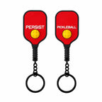 Porte-clés raquette de pickleball en PVC, coloris alternatif parmi les 8 proposés.