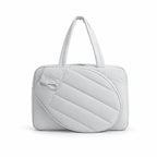 Sac bandoulière pickleball coloris gris clair, vue de face avec anses courtes et poche raquette ovale